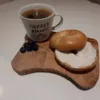 Cream cheese bagel and black coffee.